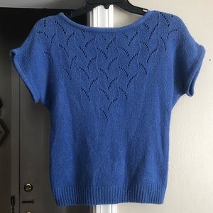 Beautiful blue knitted top with dot design cut outs